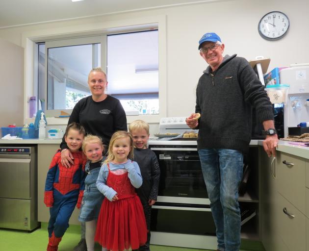 Kopuwai Early Learning Centre educator Catherine Gale (left), Kohen Mason, 4, Violet Routel, 3,...