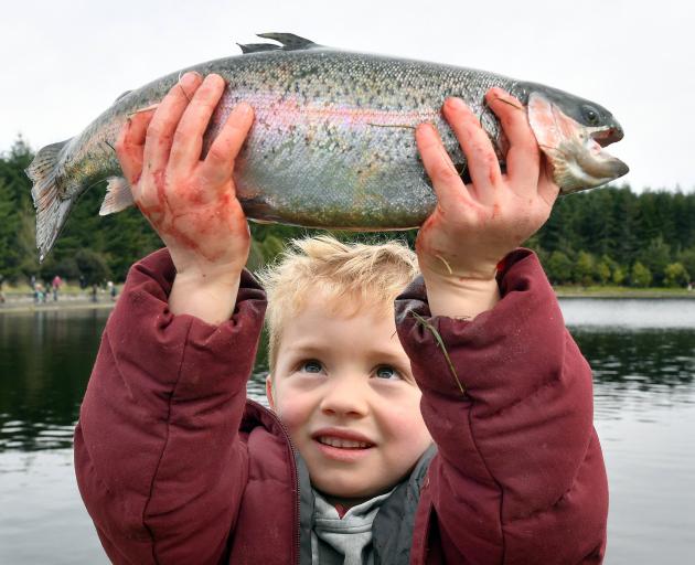 Patrick Stephens caught his first fish, a 1.4kg rainbow trout, at the Take a Kid Fishing event,...