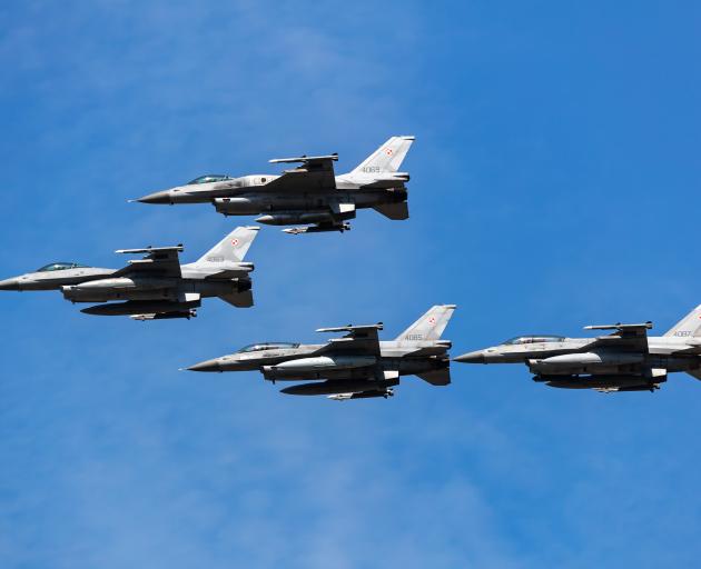 Polish fighter jets flying in formation in 2023. File photo: Getty Images
