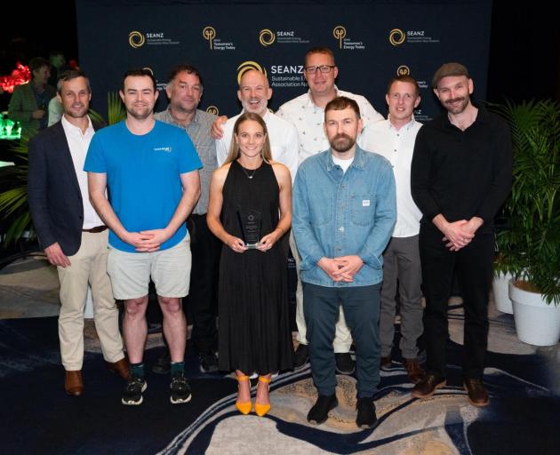 Celebrating their success at the SEANZ awards are the Think Solar Group team (back row from left)...