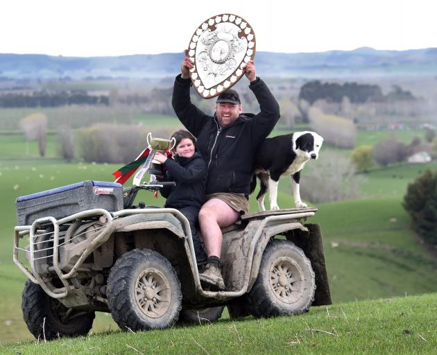 Andrew Begg, daughter Charlotte, 6, and dog Patch, out on their farm at Mt Wallace near Stirling,...
