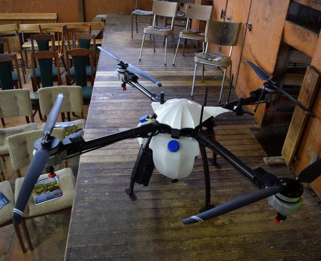 An Agri-copter AC-16 drone on display in a woolshed in Cave.