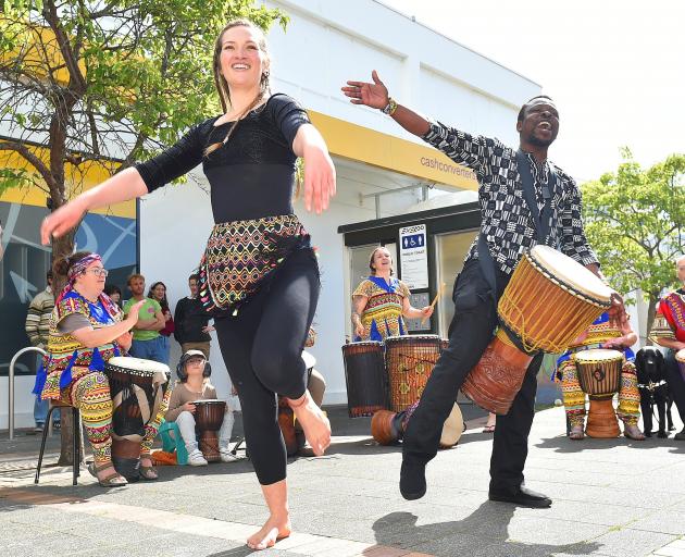 Dancers Anonymous performer Catherine Schroder dancing with Kadodo African Drumming founder...