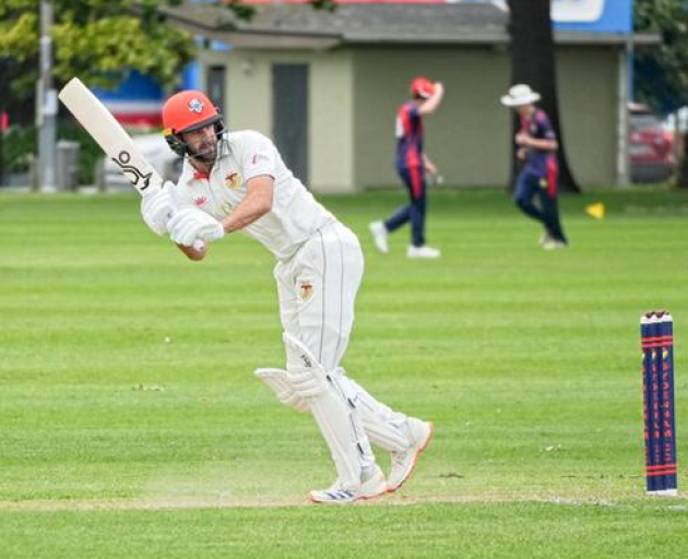 Sydenham's Chad Bowes gets a shot away during day one of the match against Burnside at Sydenham...