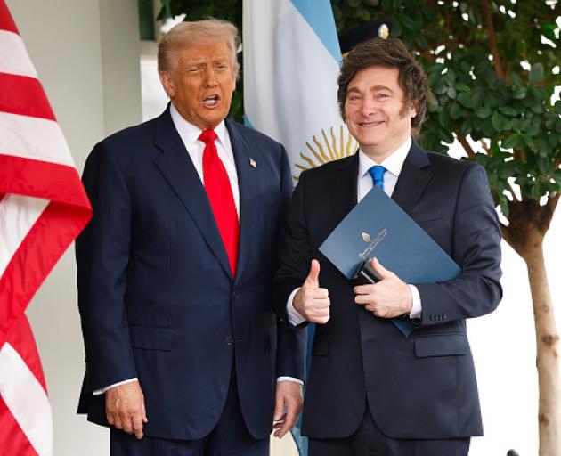 United States President Donald Trump greets President of Argentina Javier Milei. PHOTO: GETTY IMAGES
