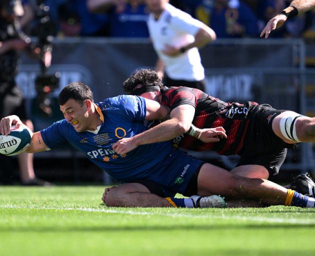 Thomas Umaga-Jensen of Otago scores the first try in the NPC final match between Canterbury and...