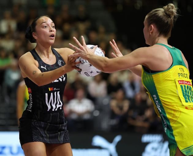 Silver Ferns wing attack Mila Reuelu-Buchanan looks for her options down the court under pressure...