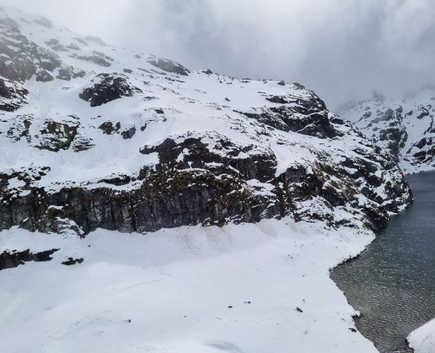 The Routeburn Track traverses across these snow-laden bluffs above Lake Harris. PHOTOS: DOC