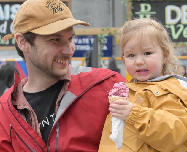 Alba Salvesen, 2, enjoys an ice cream with her dad, Hamish Salvesen, of Normanby.