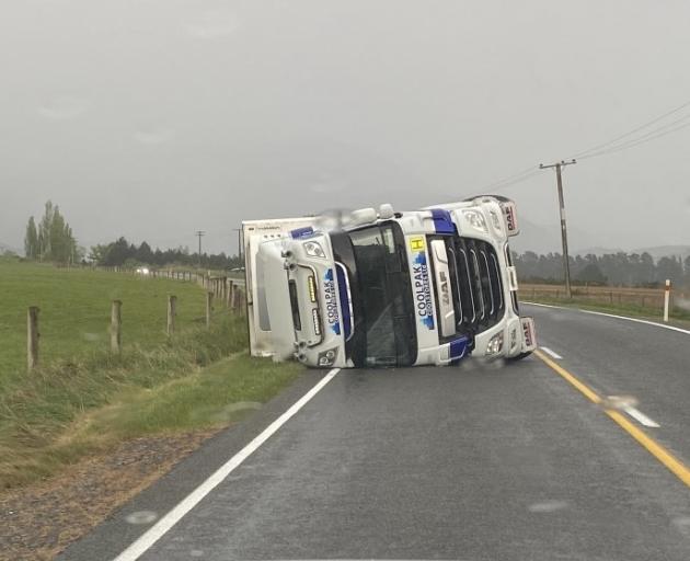 The truck rolled on State Highway 73, west of Springfield. Photo: NZTA