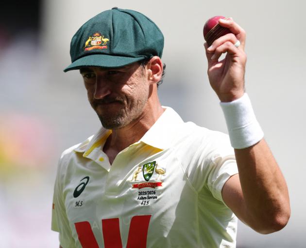 Mitchell Starc acknowledges the crowd after his seven-wicket in the first Ashes test in Perth on...