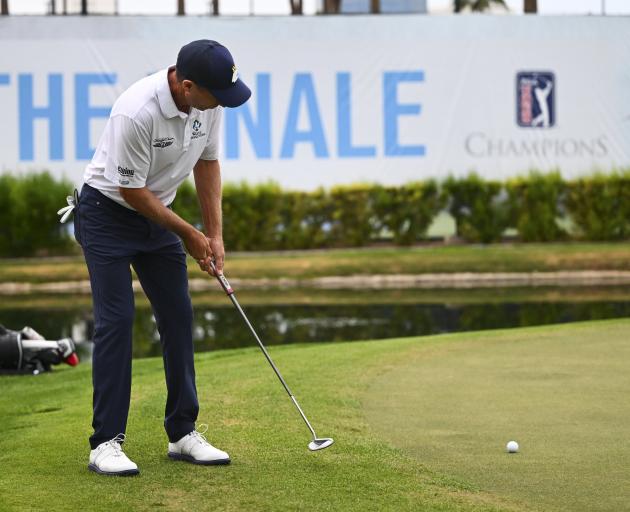 New Zealand’s Steven Alker putts on the 18th green during the Charles Schwab Cup tournament in...