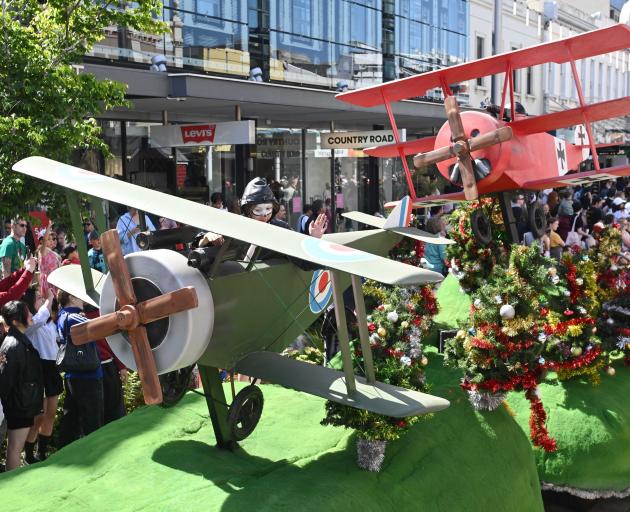 Snoopy and the Red Baron delight during last year’s Dunedin Santa Parade. PHOTO: GERARD O’BRIEN...