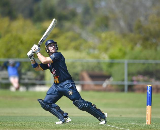 Taieri opener Ruben Clinton lofts one into the deep during the opening round of Dunedin club...