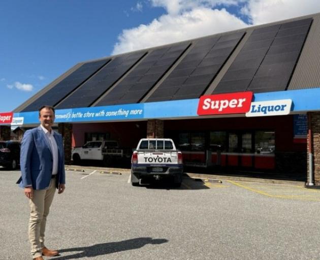 Gate Group chief executive Glen Christiansen outside the Super Liquor Cromwell. PHOTO: ALLIED...