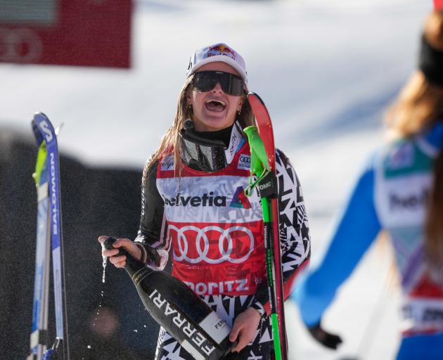 Alice Robinson celebrates taking 1st place during the Audi FIS Alpine Ski World Cup Women's Super...