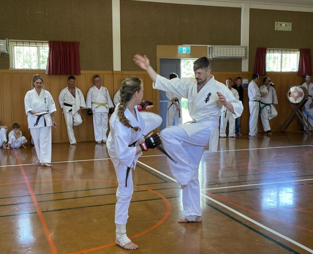 Mackenzie Smith ready to release a tough blow against Nick Taylor during a contact fight. PHOTOS:...