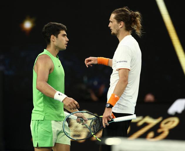 Spain's Carlos Alcaraz and Germany's Alexander Zverev after their epic semi final match. Photo:...