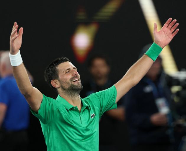 An exhausted Novak Djokovic after defeating Jannick Sinner in five sets in Melbourne. Photo:...