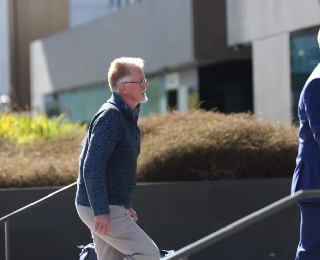 St Bede's College Fr Rowan Donoghue arrives at Christchurch District Court for an appearance...