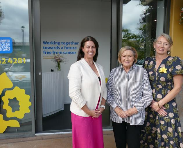  Cancer Society interim CEO Meredith Woods Ford, left, with longtime local and Cancer Society...
