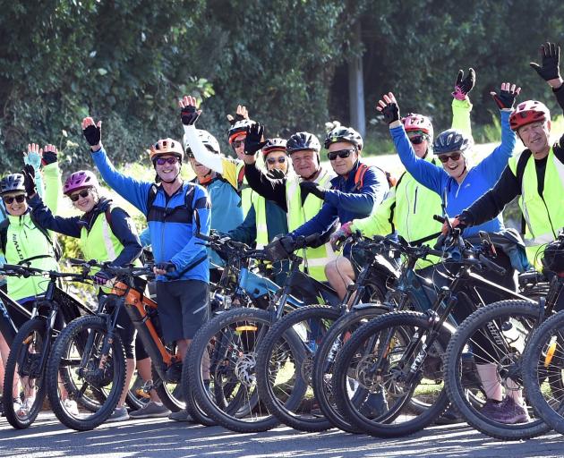 E-Bike riders prepare to take off from the Careys Bay Hotel for their mid-week social bike ride...