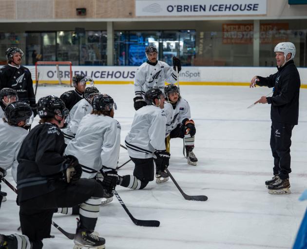 Ice Blacks coach AJ Spiller talks to his players ahead of their tournament in Bulgaria.