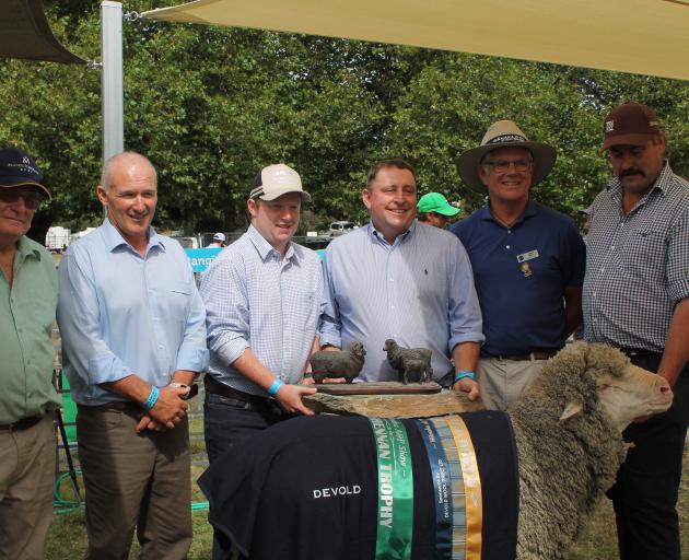 With the supreme champion merino ram at the Wānaka A&P Show are Ron Small (Blairich Merinos),...