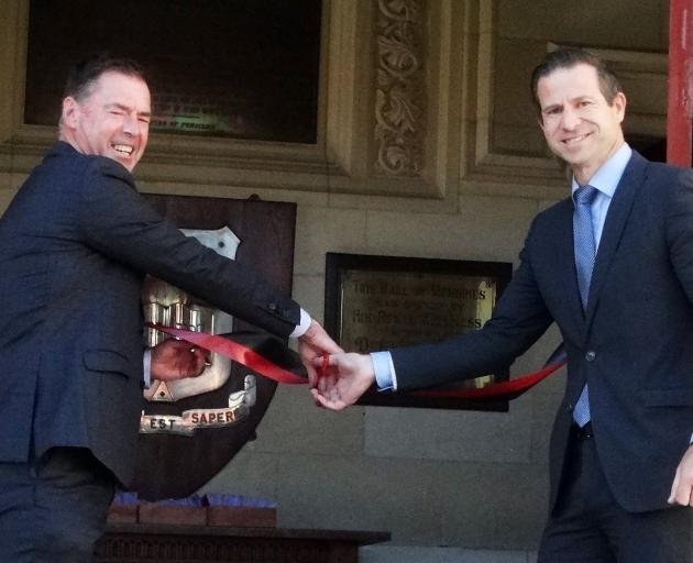 Minister for Veterans Chris Penk (right) cuts the ribbon for the Waitaki Boys’ High School Hall...