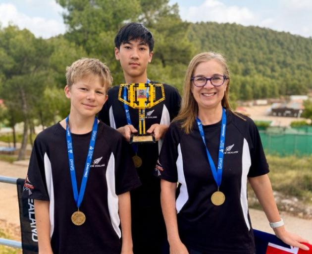 Queenstown Robostormers, from left, Jasper Eckford, Ollie Sharpe and coach Paula Hugens. Photo:...