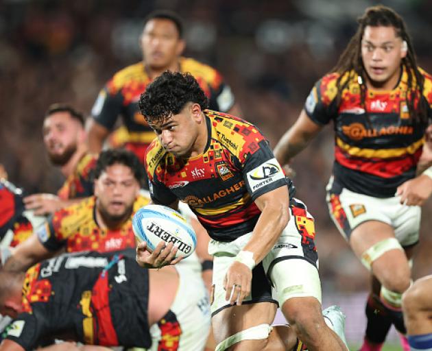 Wallace Sititi of the Chiefs runs in for a try during the round 16 Super Rugby match between...