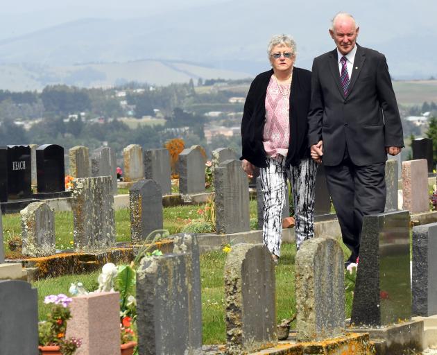 Kevin Henderson and his wife Pam (pictured in December 2017) stroll through the Balclutha Lawn...