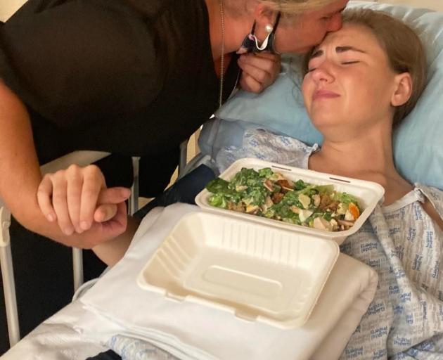 Maddie Collins and her mum in hospital. Photo: Supplied