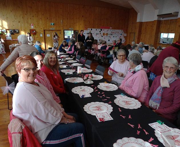Happy attendees take part in the Pink Ribbon Breakfast in Palmerston last Friday. PHOTOS: CHARLEY...