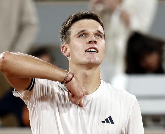 Jakub Mensik celebrates winning his quarter final match against Joao Fonseca. Photo: Reuters