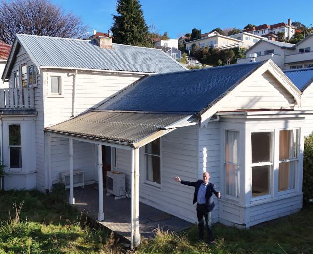 Planner Conrad Anderson is hoping someone will remove the historic house at 56 Cargill St rather...