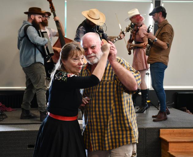 Australian lovebirds Bruce Howlett and Isabelle Lyttle dance to the tune of their beloved band...