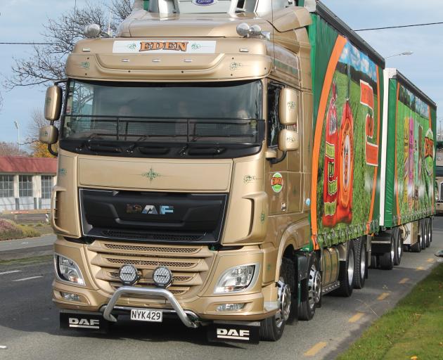 John Coxshall from Eden Haulage (left) won the 400,000 - 700,000km section and Best DAF.
