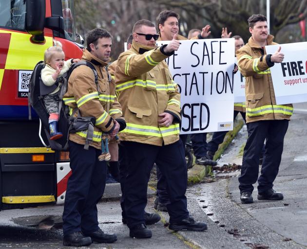 Firefighters outside Willowbank station, Dunedin, during a previous nationwide one-hour strike....