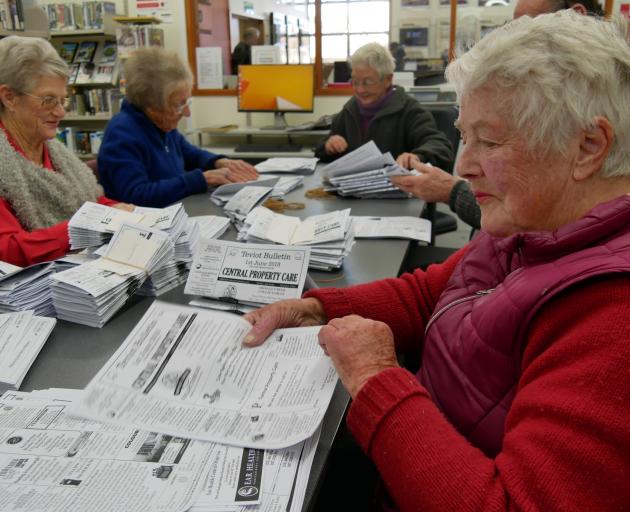 Margaret Lory, who takes her monthly turn folding newsletters, is delighted to have found...