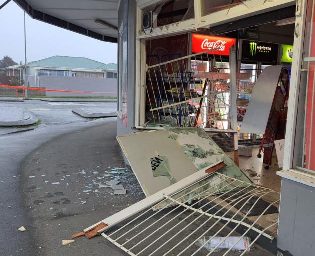 Barkers Convenience store was badly damaged. Photo: John Cosgrove