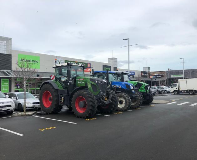 Tractors parked up at the Tower Junction shopping centre car park in Christchurch. Photo: Ross...
