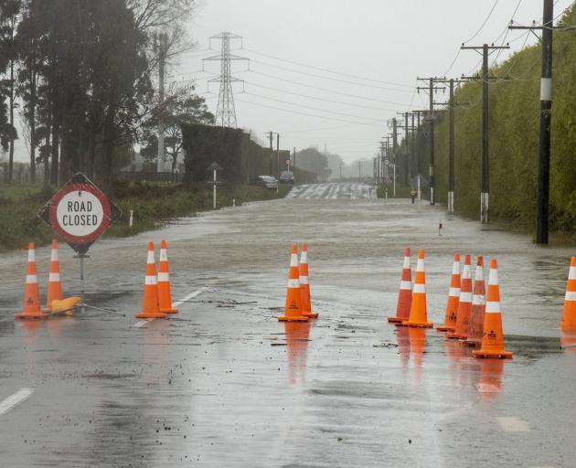 Shands Rd has been closed due to flooding. Photo: Geoff Sloan