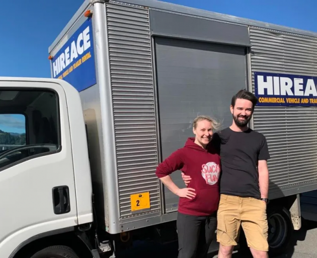 Tim and partner Jo on moving day in 2022. Photo: Supplied