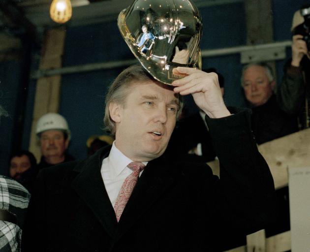 Donald Trump at a ceremony to open one of his buildings, Trump Palace, n the 1990s. Photo: AP