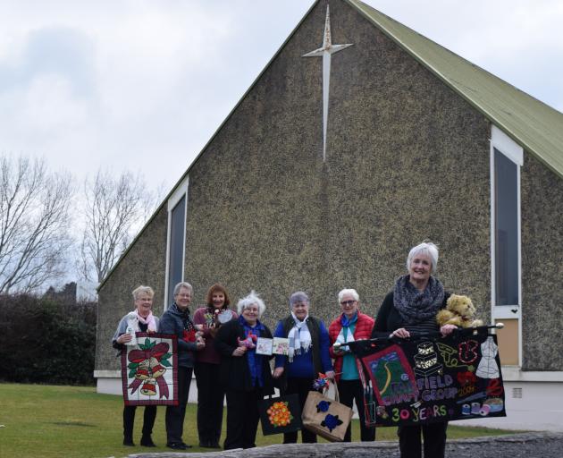 Fairfield Craft Group president Diane McNutt (front) with members (from left) Anne Watkins,...