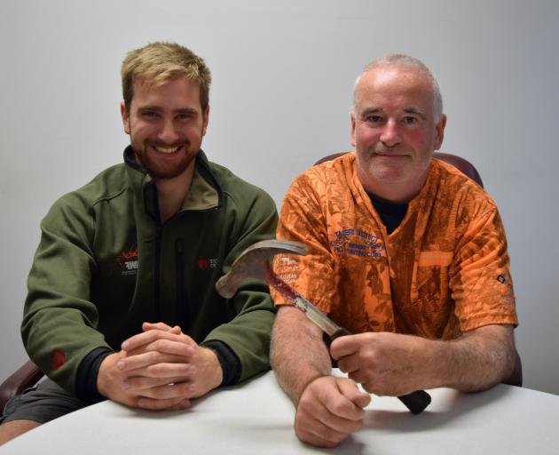 Taieri District Pig Hunting Club member Dave Gillies (left) and president Mike ‘‘Buzz’’ Burrell Taieri District Pig Hunting Club member Dave Gillies (left) and president Mike ‘‘Buzz’’ Burrell