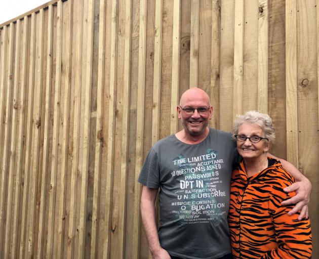 Rose Cabral and her son Peter are pleased by the lack of noise coming from the new BP station...