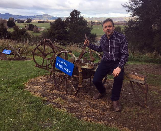 Outram Charitable Trust chairman Dean McAlwee relaxes on a potato digger at the Taieri Historical...