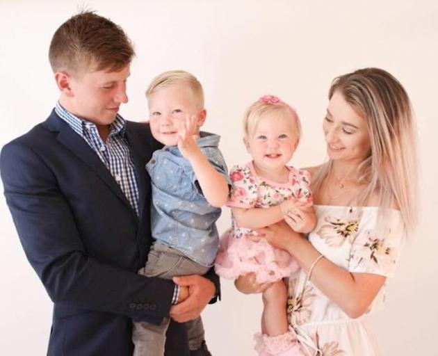 Jeremy Max with wife Zoe and two of their three children. Photo: supplied 